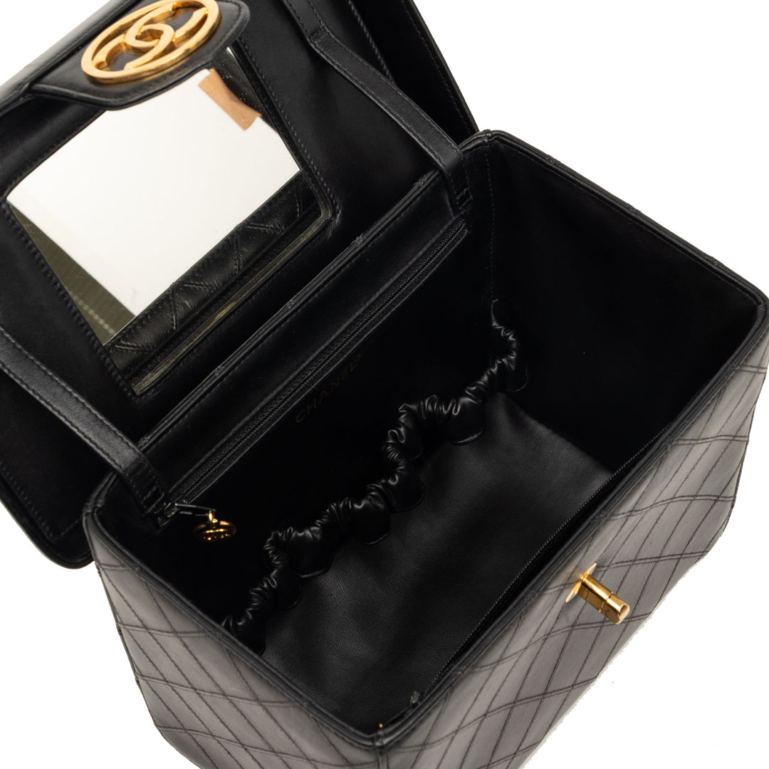 Chanel CC Surpiqué Cuir de veau Turnlock Vanity