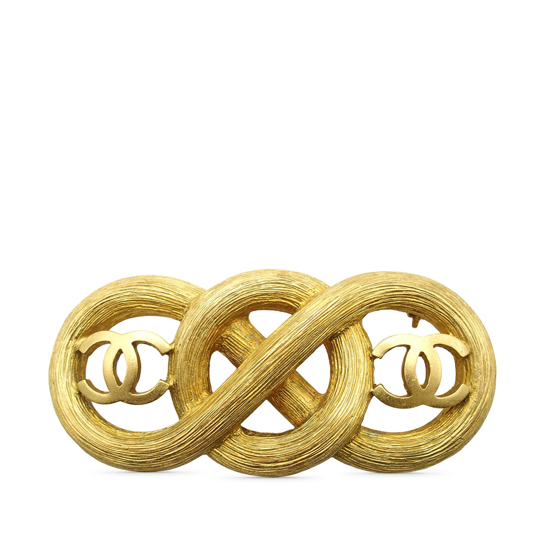 Chanel Broche CC Infinity plaqué or – vue principale – GABY PARIS