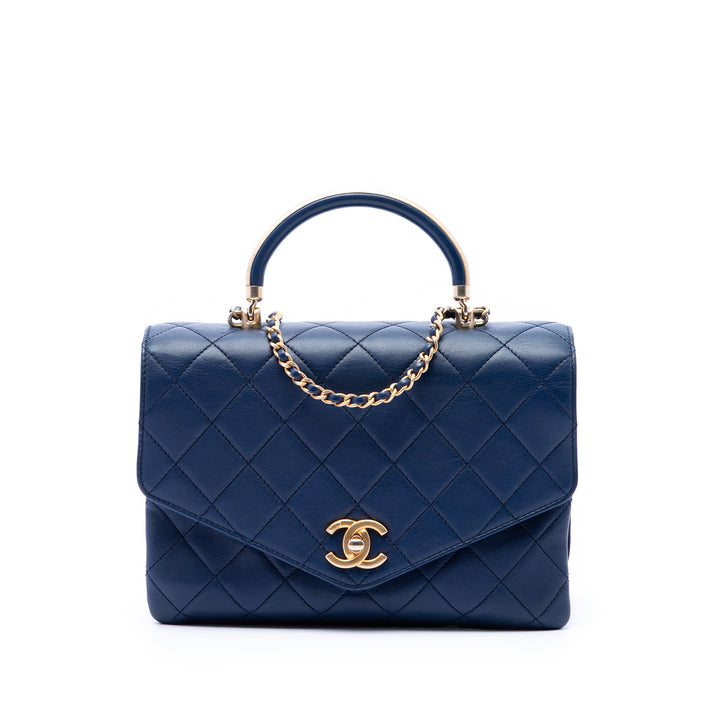 Chanel CC Matelassé Cuir de veau Metal anse supérieure Envelope à rabat