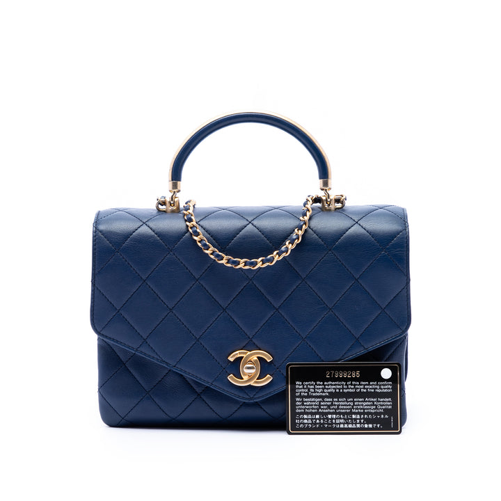 Chanel CC Matelassé Cuir de veau Metal anse supérieure Envelope à rabat