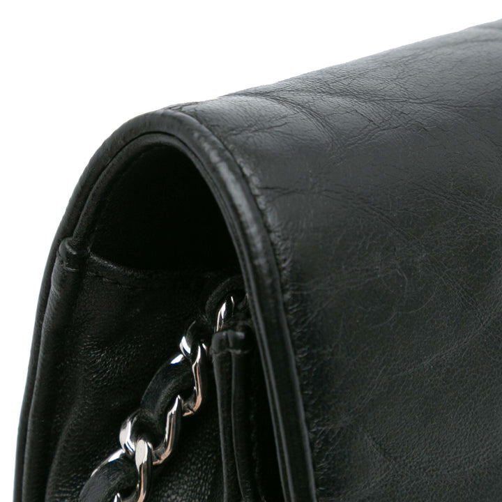 Chanel CC Embossed Cuir d’agneau Camellia Wallet On Chain Noir