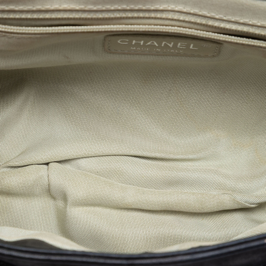 Chanel CC Matelassé Cuir d’agneau Sac rond à chaîne à rabat