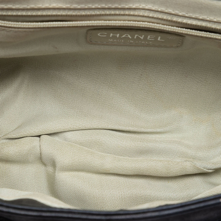 Chanel CC Matelassé Cuir d’agneau Sac rond à chaîne à rabat