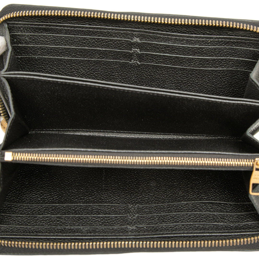 Whipstitch Zippy Portefeuille Monogram Empreinte Noir