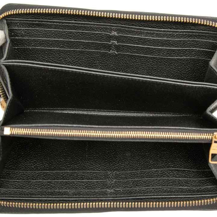 Whipstitch Zippy Portefeuille Monogram Empreinte Noir