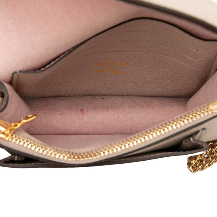 Louis Vuitton Pochette Souple My Lockme Chaîne Mini Cuir de veau Beige – vue 4 – GABY PARIS