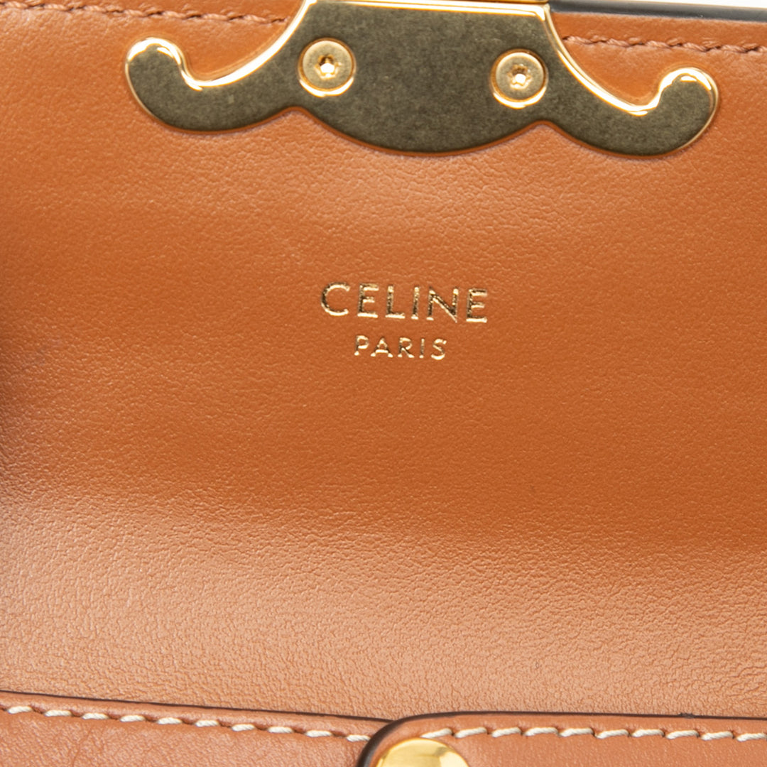 Triomphe Claude Sac Mini Triomphe enduite Marron