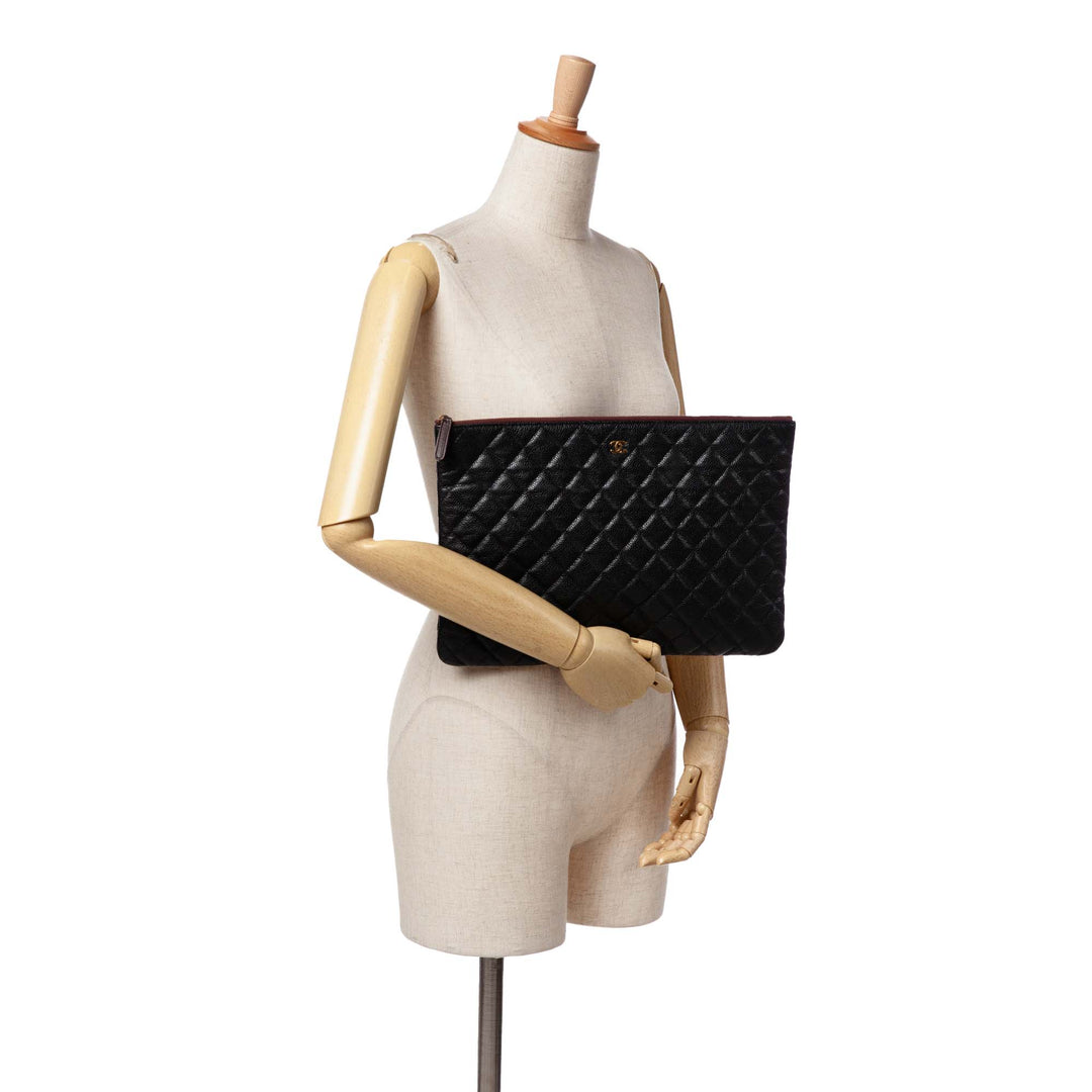 Large Quilted Caviar O Case Clutch Black - Gaby Paris