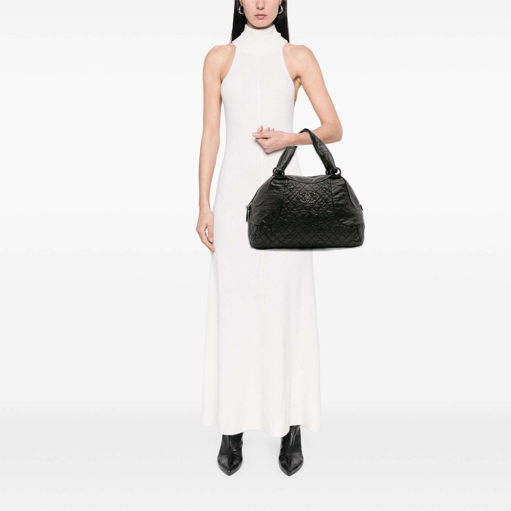 CC Quilted Aged Calfskin Coco Rider Bowling Bag Black - Gaby Paris