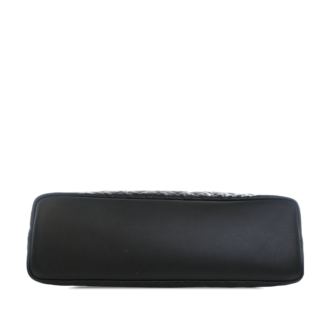 Saint Laurent Matelassé Cuir de veau Monogram ES Giant Sac de voyage