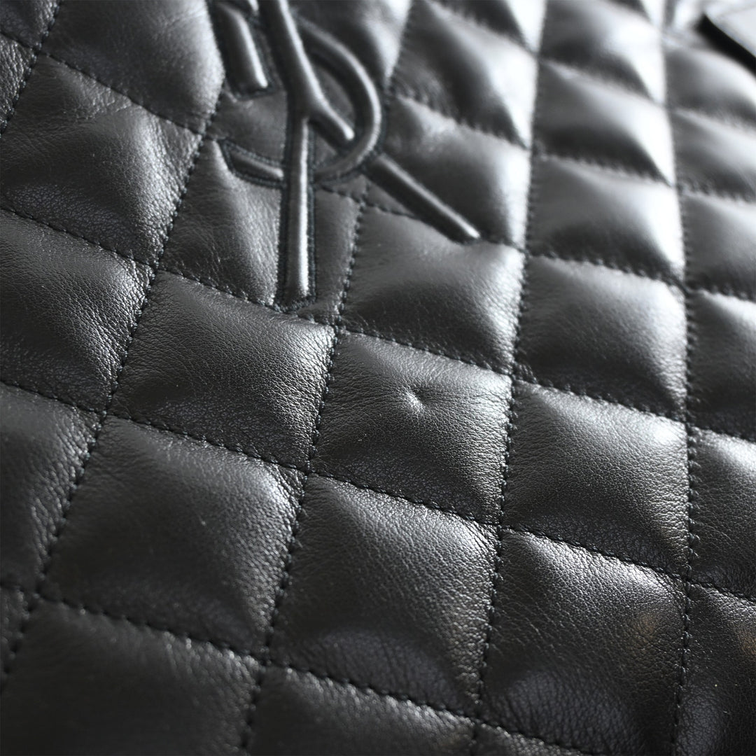 Saint Laurent Matelassé Cuir de veau Monogram ES Giant Sac de voyage