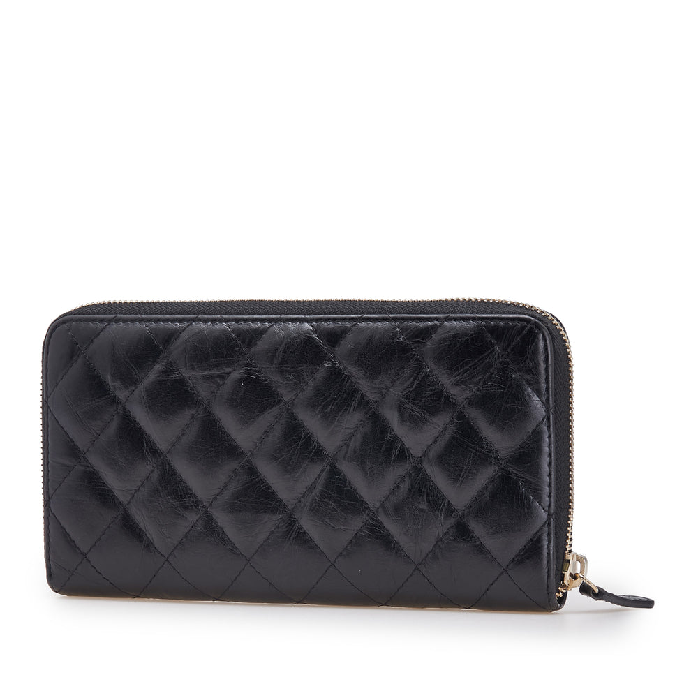 Chanel Reissue 2.55 Quilted Aged Cuir de veau Zip Around Wallet Noir – GABY PARIS Authentique