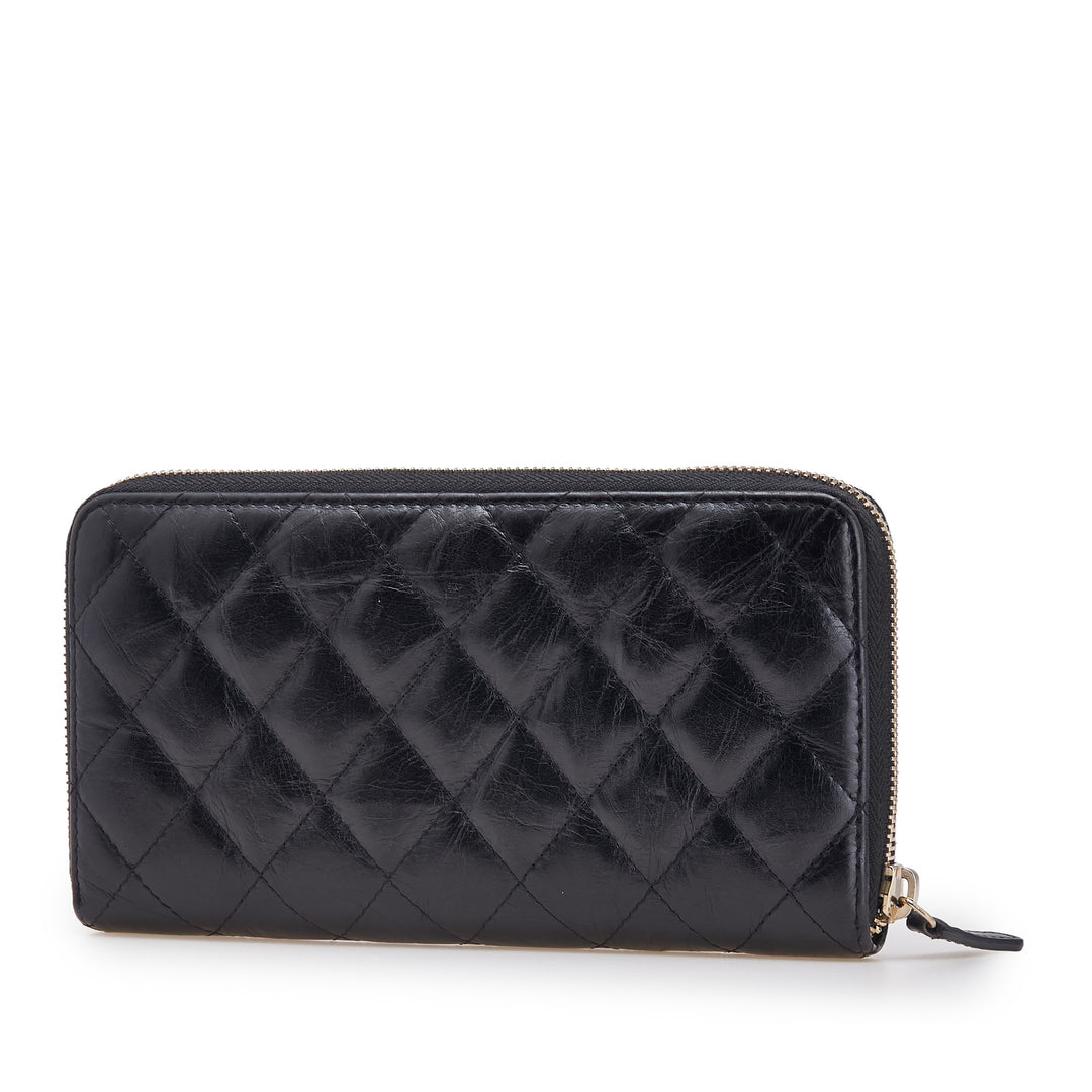 Chanel Reissue 2.55 Quilted Aged Cuir de veau Zip Around Wallet Noir – GABY PARIS Authentique
