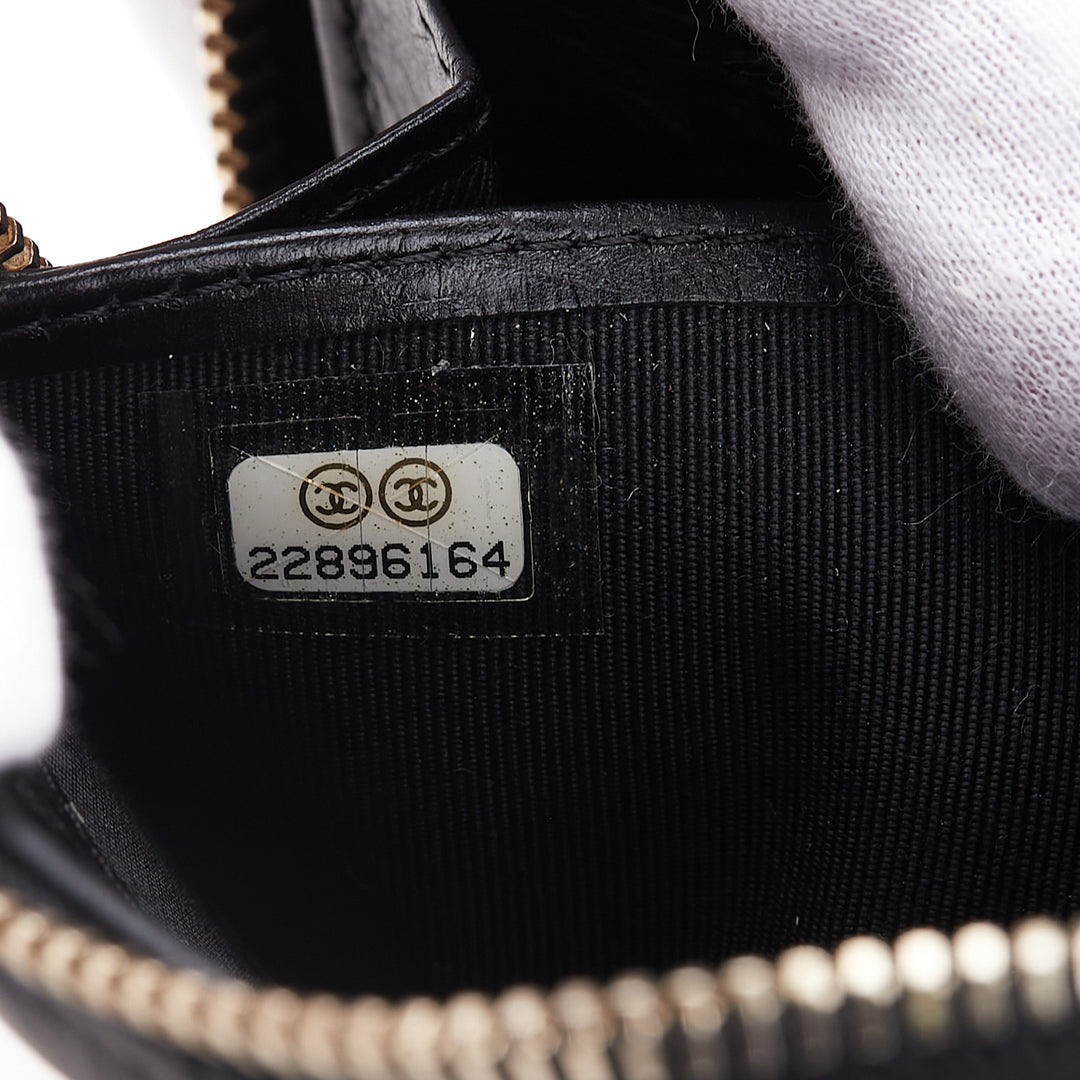 Chanel Reissue 2.55 Quilted Aged Cuir de veau Zip Around Wallet Noir – GABY PARIS Authentique
