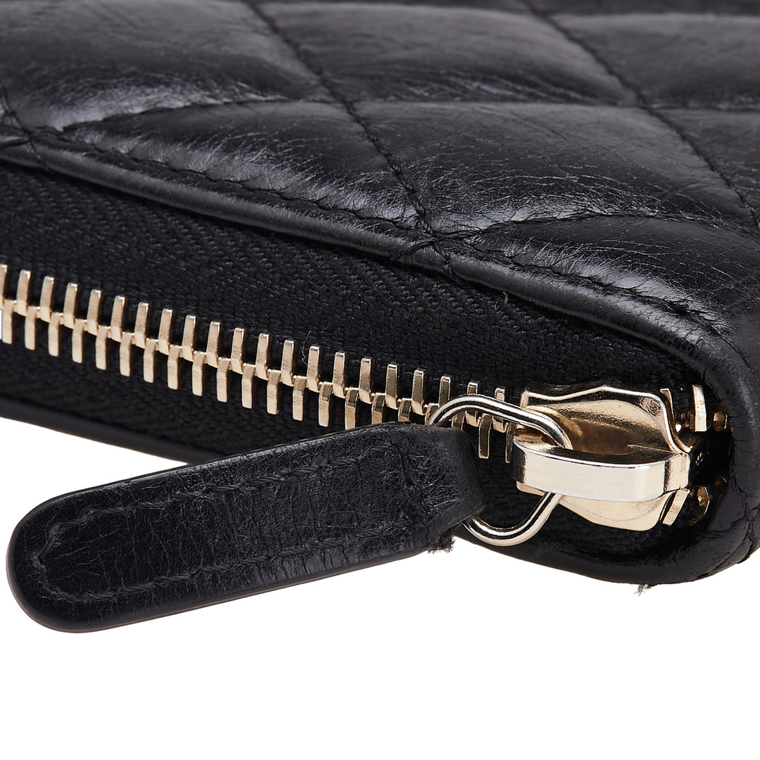 Chanel Reissue 2.55 Quilted Aged Cuir de veau Zip Around Wallet Noir – GABY PARIS Authentique
