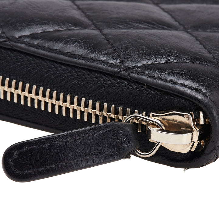 Chanel Reissue 2.55 Quilted Aged Cuir de veau Zip Around Wallet Noir – GABY PARIS Authentique