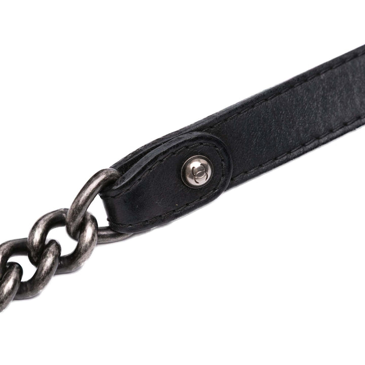 Chanel Medium Quilted Cuir de veau Whipstitch Chain Around Boy Top Handle Flap Noir – GABY PARIS Authentique