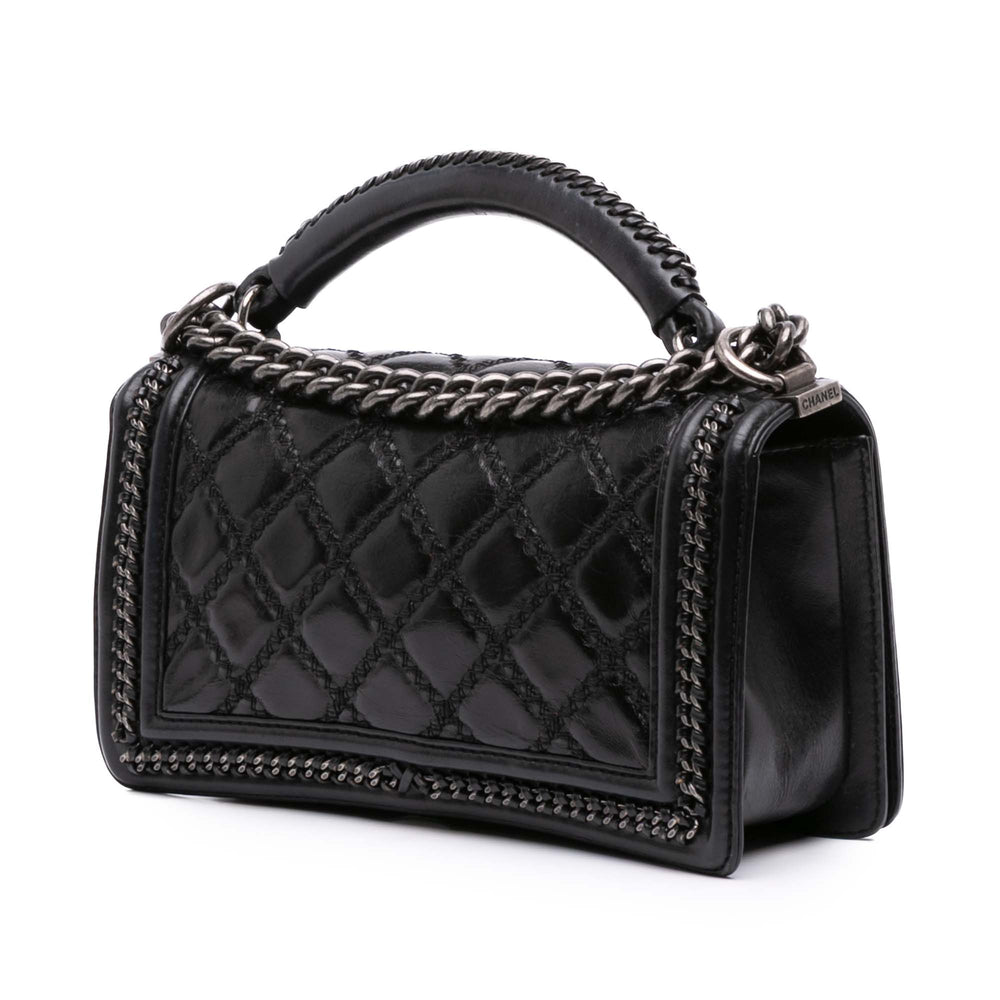 Chanel Medium Quilted Cuir de veau Whipstitch Chain Around Boy Top Handle Flap Noir – GABY PARIS Authentique