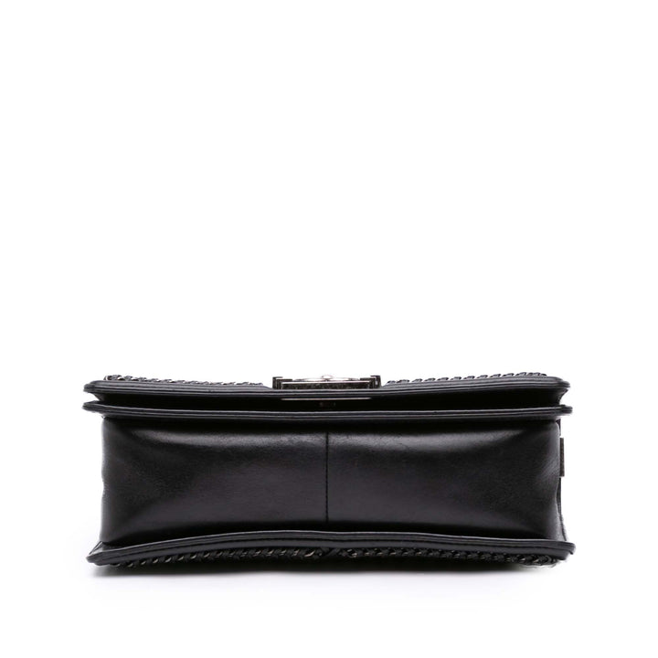 Chanel Medium Quilted Cuir de veau Whipstitch Chain Around Boy Top Handle Flap Noir – GABY PARIS Authentique