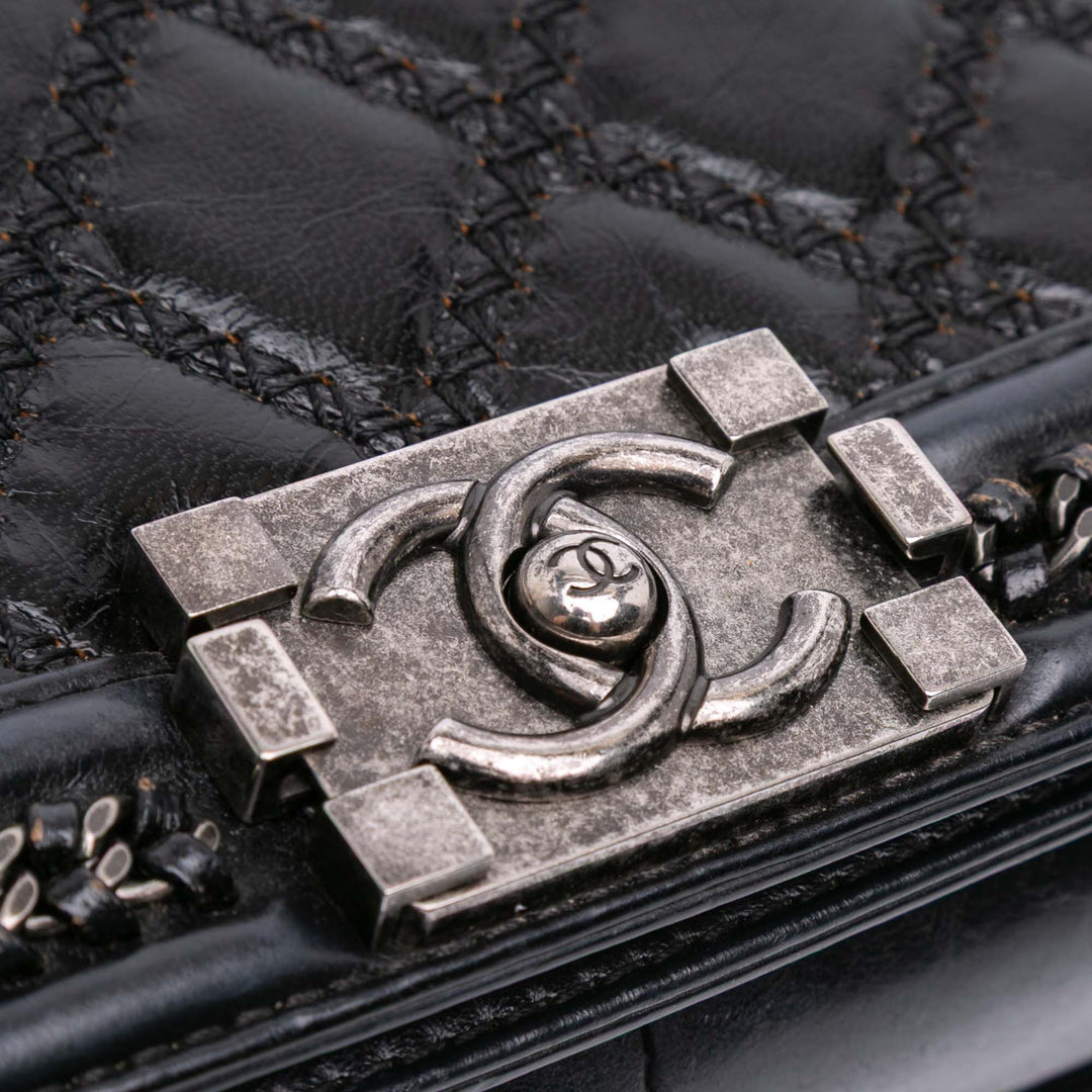 Chanel Medium Quilted Cuir de veau Whipstitch Chain Around Boy Top Handle Flap Noir – GABY PARIS Authentique