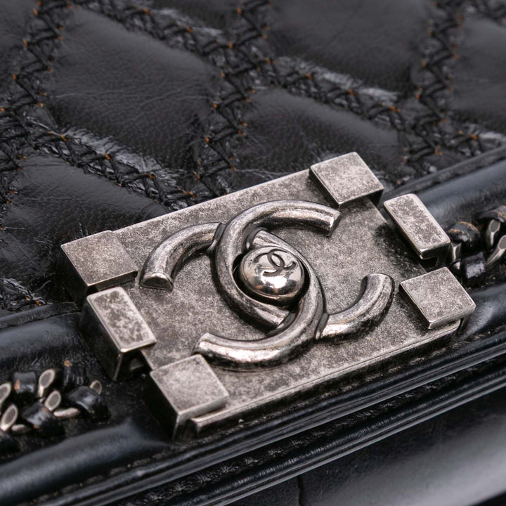 Chanel Medium Quilted Cuir de veau Whipstitch Chain Around Boy Top Handle Flap Noir – GABY PARIS Authentique