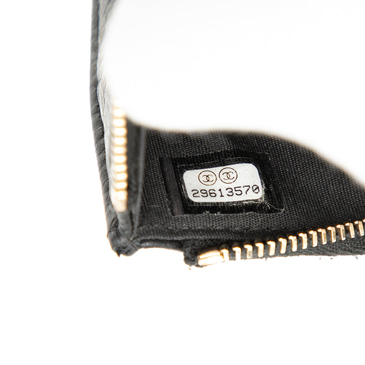 Chanel CC embossé Caviar Camellia Flat Phone Étui Wallet Pochette