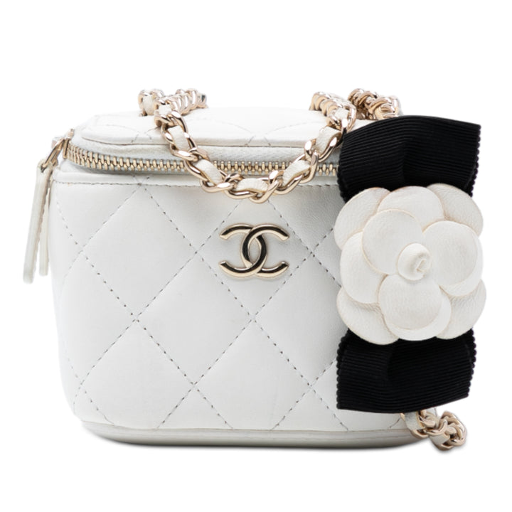 Chanel Mini Matelassé Cuir d’agneau Camellia Bow Vanity avec chaîne