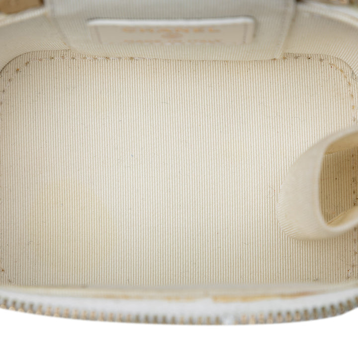 Chanel Mini Matelassé Cuir d’agneau Camellia Bow Vanity avec chaîne