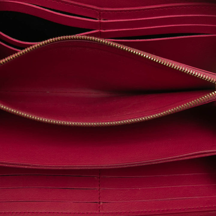 Louis Vuitton Taurillon Comete Zippy Portefeuille