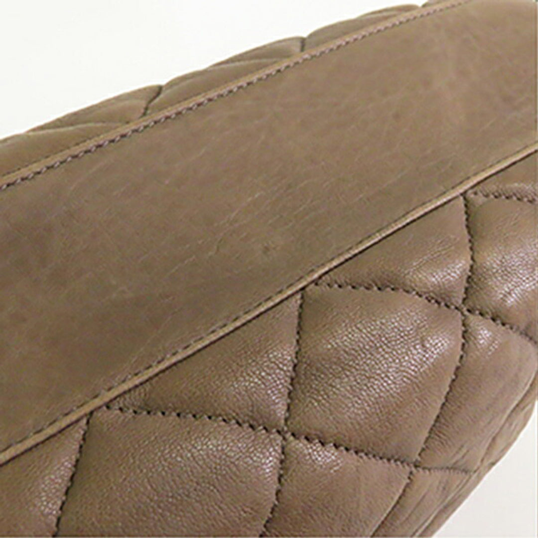 Chanel Matelassé Washed Cuir d'agneau Sac rond à chaîne Hobo