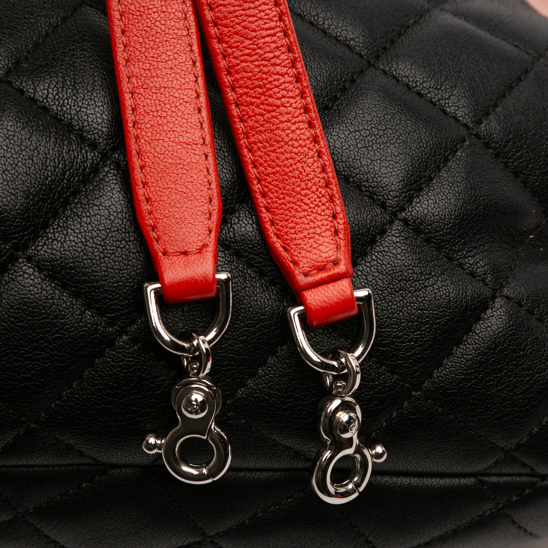 Chanel CC Matelassé Cuir d’agneau Cuba Drawstring Bucket Sac – GABY PARIS Authentique