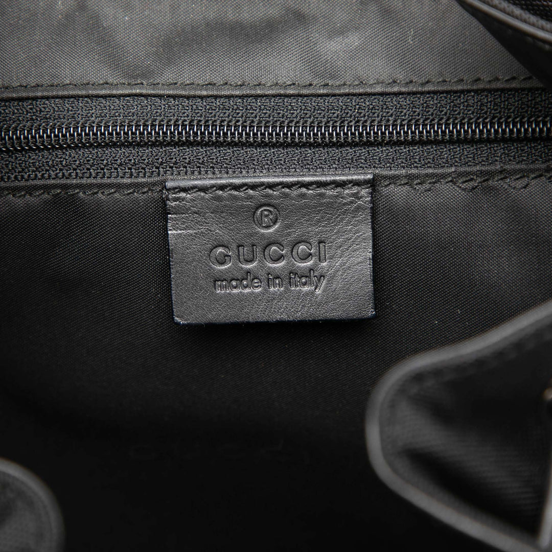 Gucci Jackie Sac à dos à cordon Toile