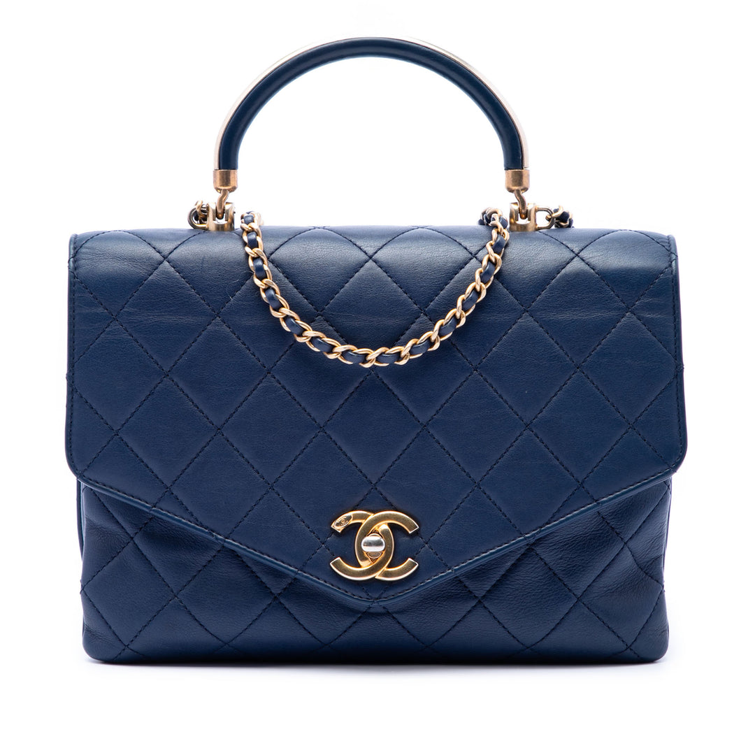 Chanel CC Matelassé Cuir de veau Metal anse supérieure Envelope à rabat