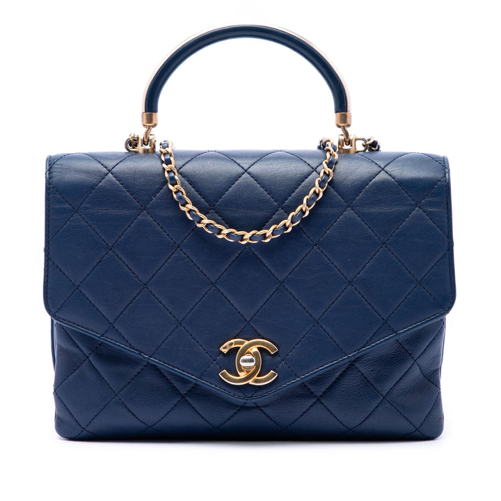 Chanel CC Matelassé Cuir de veau Metal anse supérieure Envelope à rabat