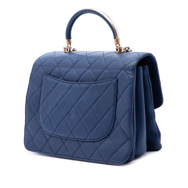 Chanel CC Matelassé Cuir de veau Metal anse supérieure Envelope à rabat