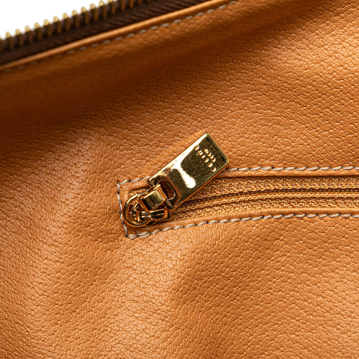 Macadam Coated Canvas Travel Bag Brown - Gaby Paris