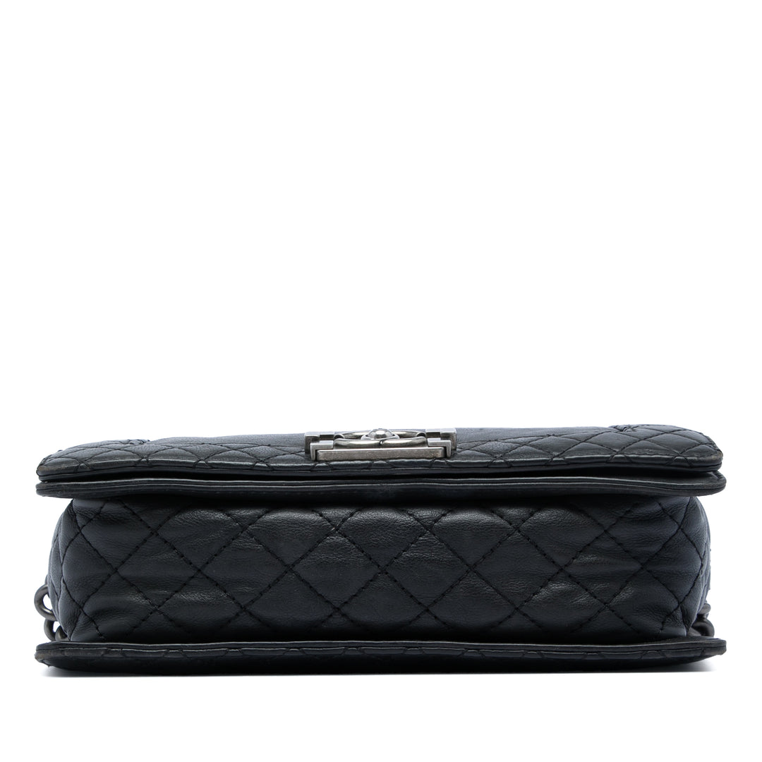 Chanel Old Medium Cuir d’agneau Boy Reverso à rabat