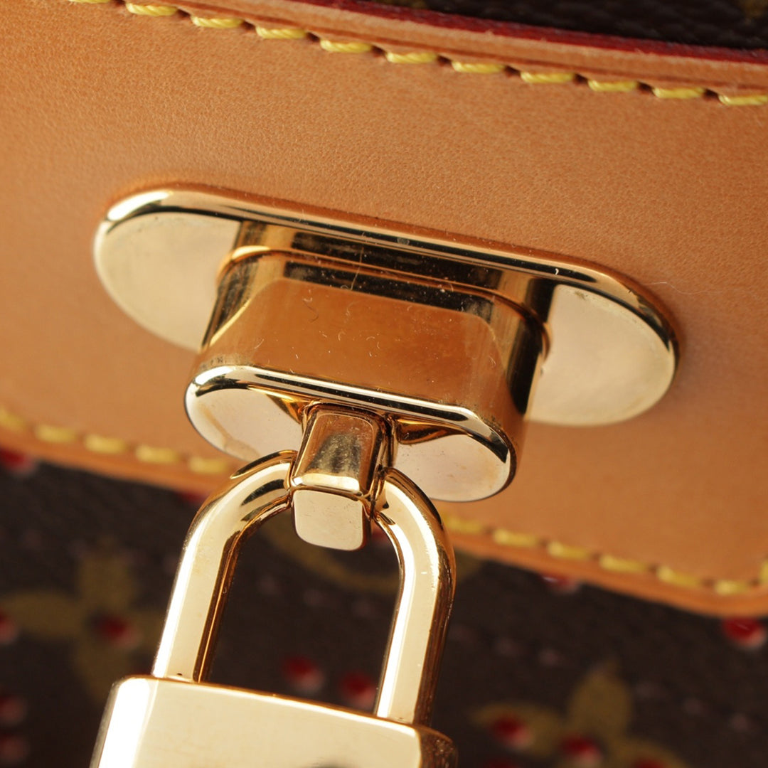 Musette perforé Monogram Marron