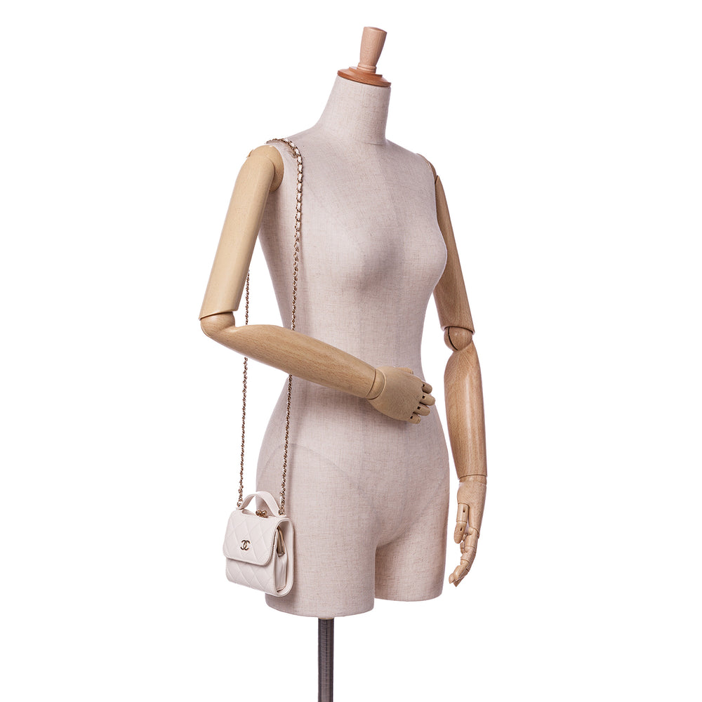 Mini CC Quilted Lambskin Kiss Lock Frame Top Handle Clutch with Chain White - Gaby Paris
