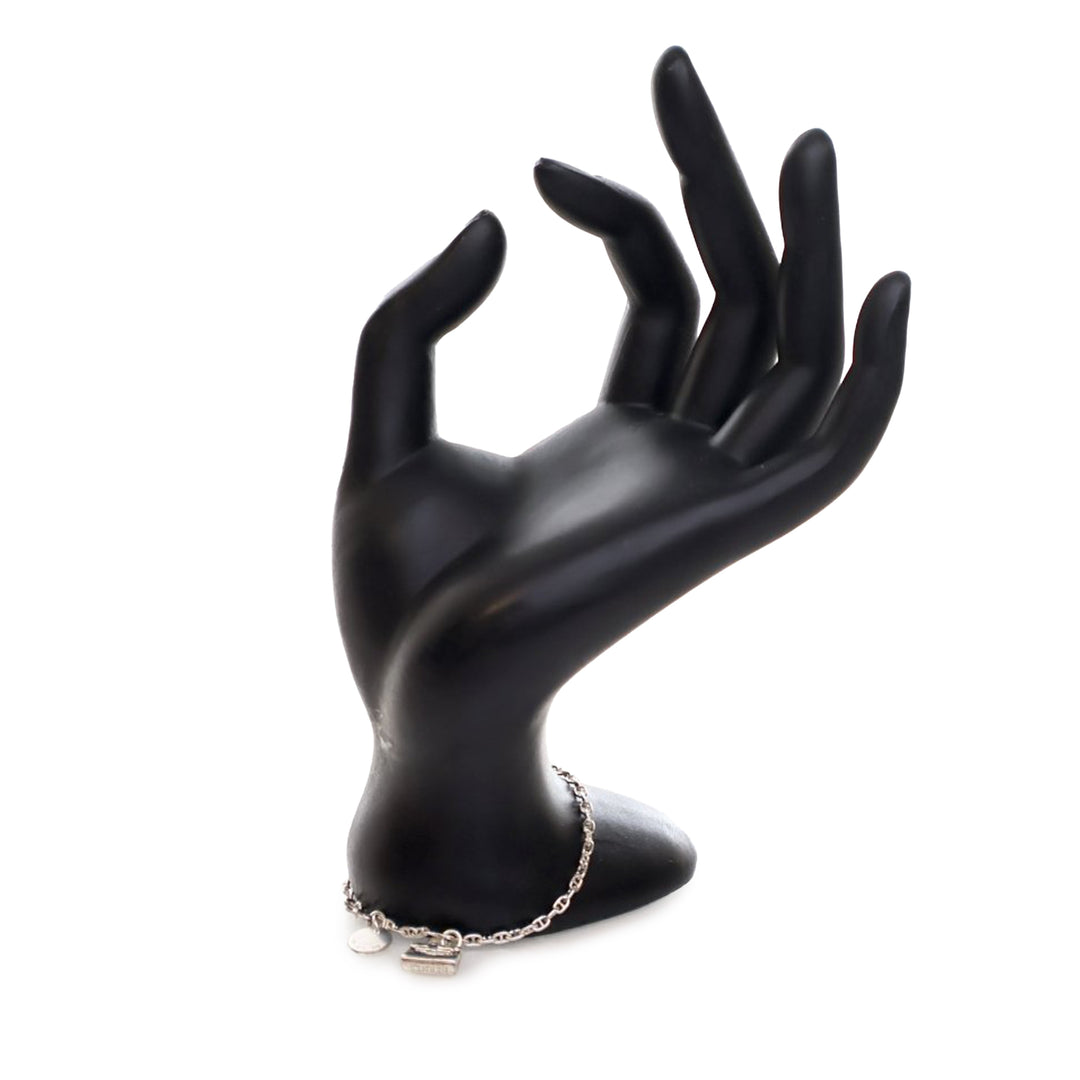 Hermès Sterling Argenté Amulettes Kelly Bracelet Argenté