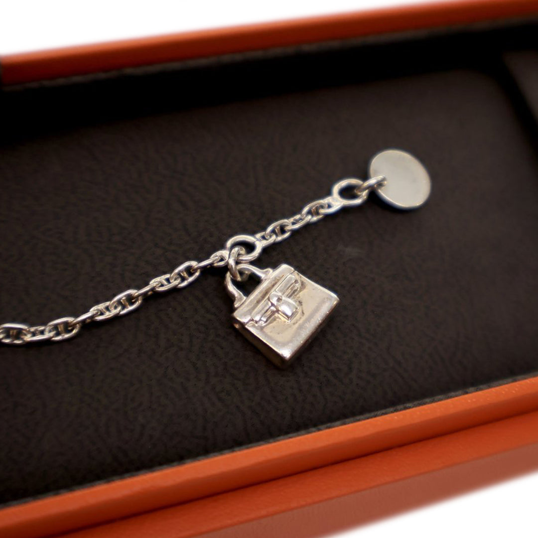 Hermès Sterling Argenté Amulettes Kelly Bracelet Argenté
