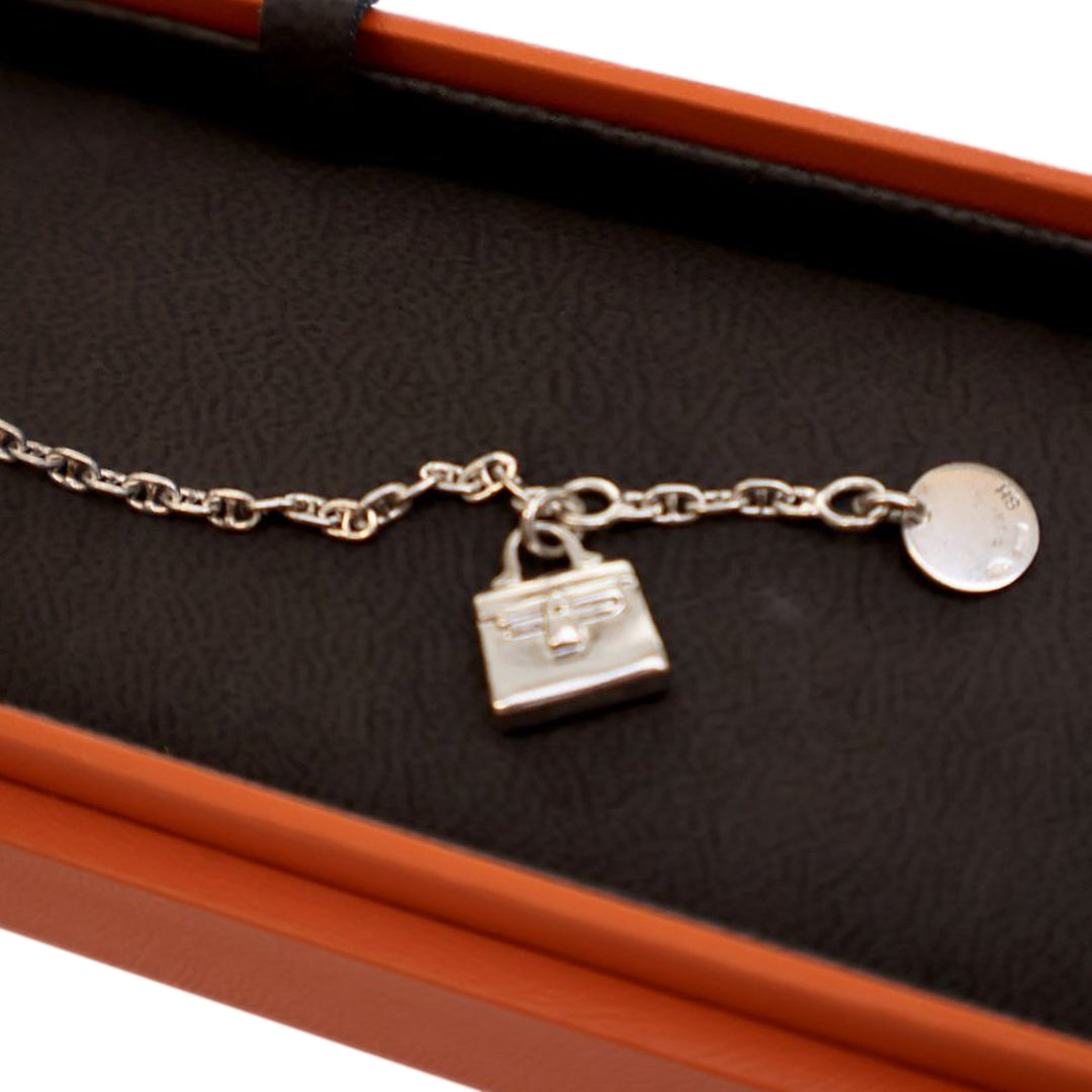 Hermès Sterling Argenté Amulettes Kelly Bracelet Argenté