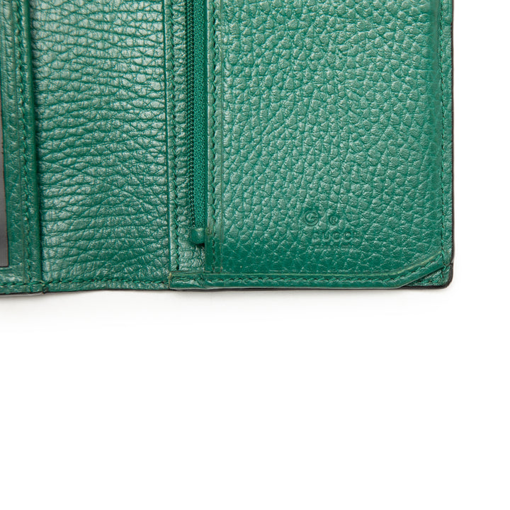 Gucci Cuir de veau Interlocking G Bifold Portefeuille long