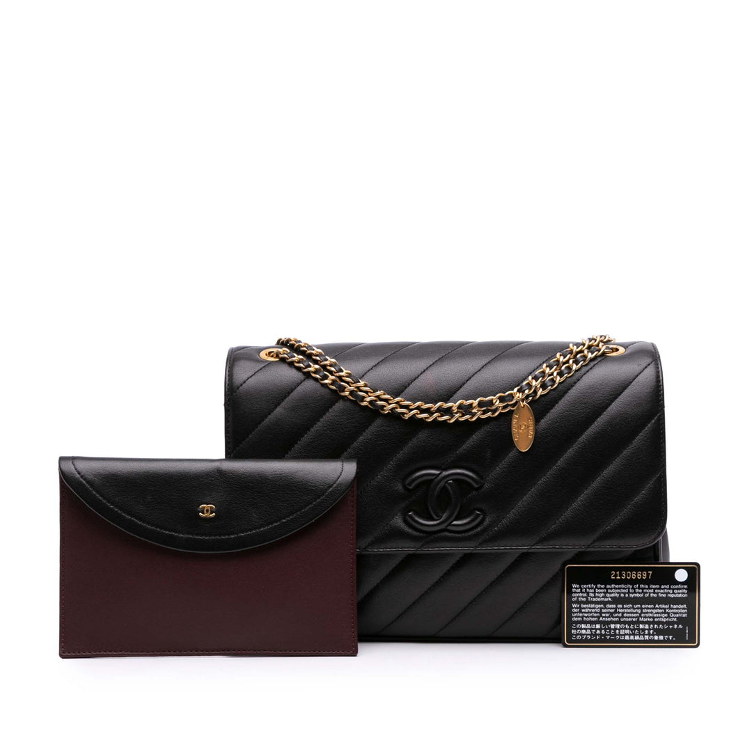 Chanel Diagonal Quilted Cuir d’agneau CC Signature Flap Noir – GABY PARIS Authentique
