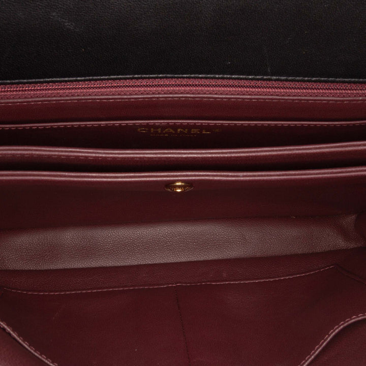 Chanel Diagonal Quilted Cuir d’agneau CC Signature Flap Noir – GABY PARIS Authentique