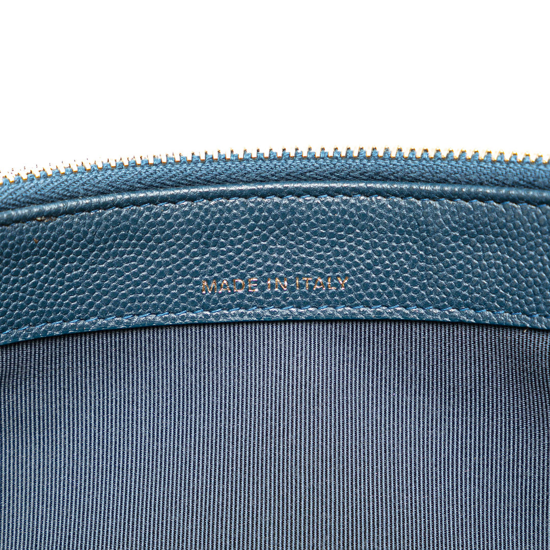 Quilted Caviar Clutch with Chain Blue - Gaby Paris