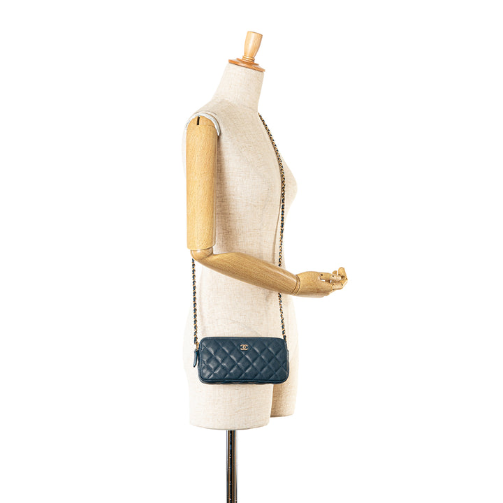 Quilted Caviar Clutch with Chain Blue - Gaby Paris