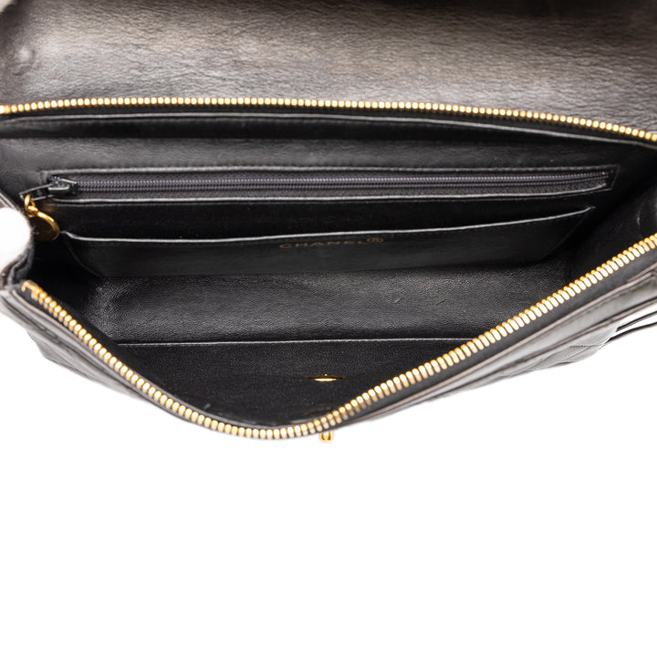 Chanel Matelassé à rabat Sac à dos Moyen Cuir d'agneau Noir