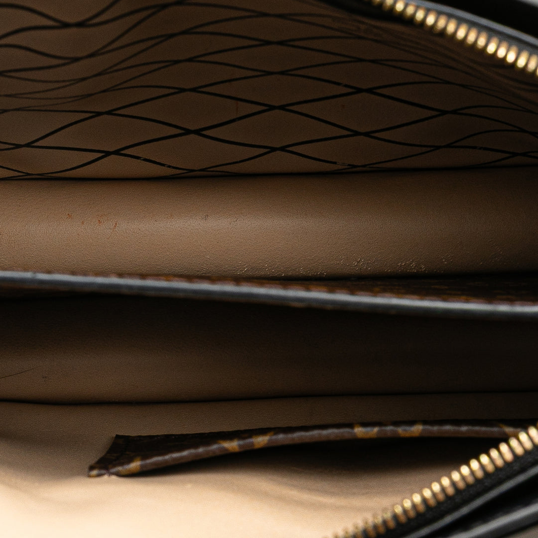 Louis Vuitton Monogram Reverse Trunk Pochette Marron – GABY PARIS Authentique
