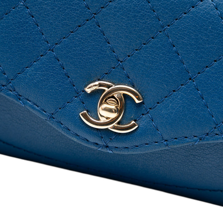 Chanel Mini Matelassé Cuir de chèvre Coco Curve à rabat